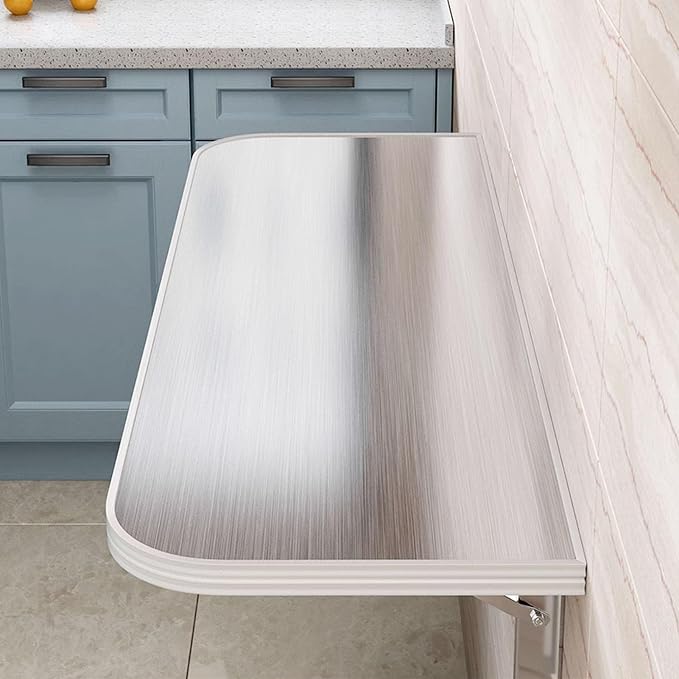 Space-Saving Wall-Mounted Folding Table by Unknown