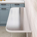 Compact Foldable Wall-Mounted Table by Unknown